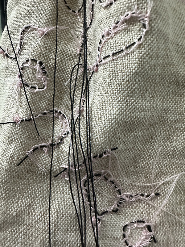 BETWEEN THE BODY AND BELONGING