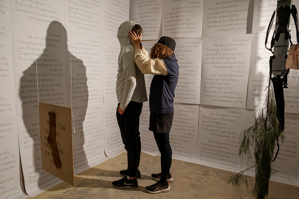 BETWEEN THE BODY AND BELONGING