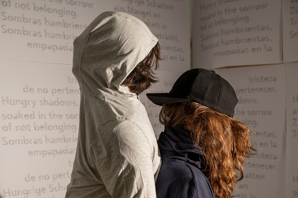 BETWEEN THE BODY AND BELONGING